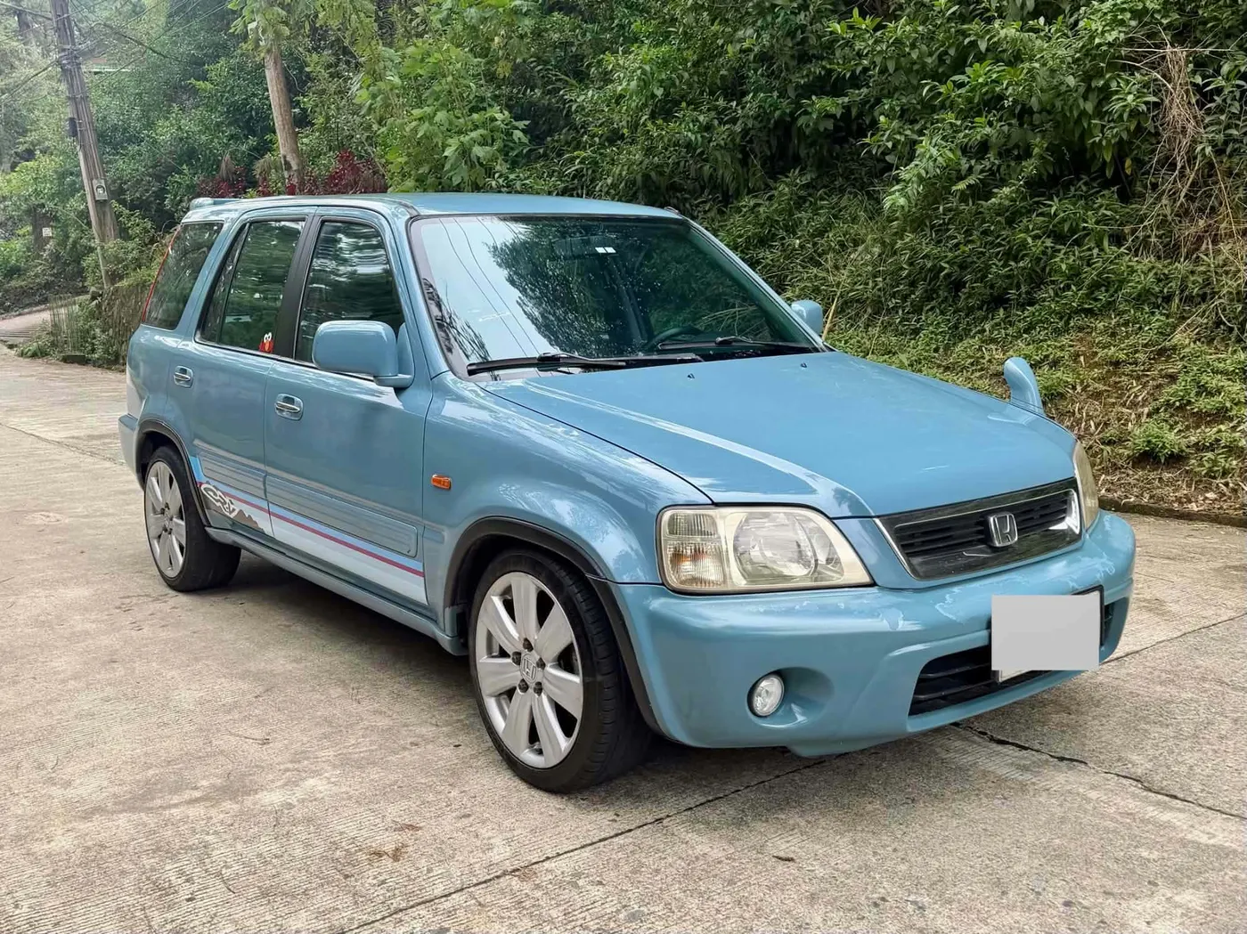 Light blue first-generation Honda CR-V