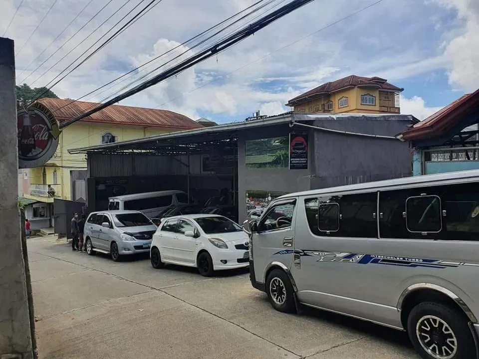 Cars lined up outside the shop